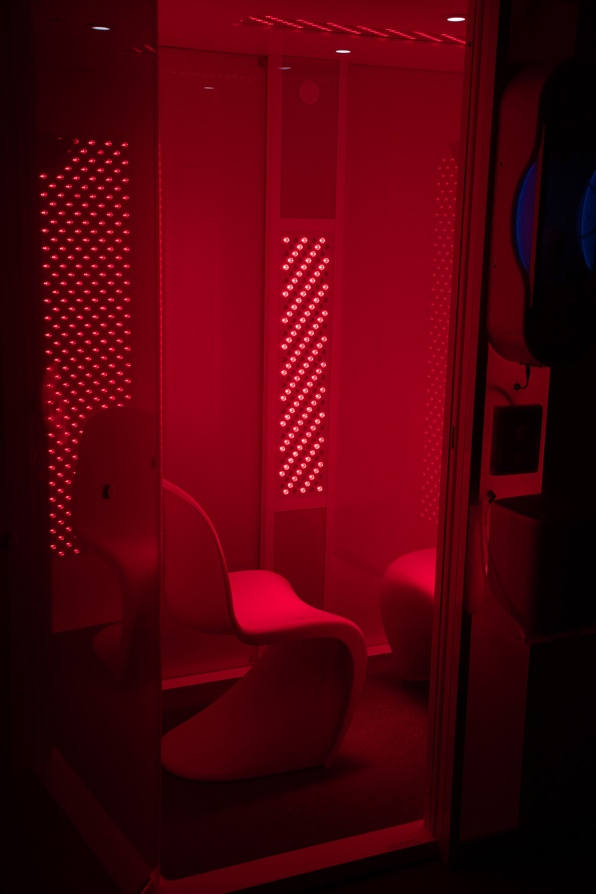 MARC Vitality Suite with full-body red light panels and seating